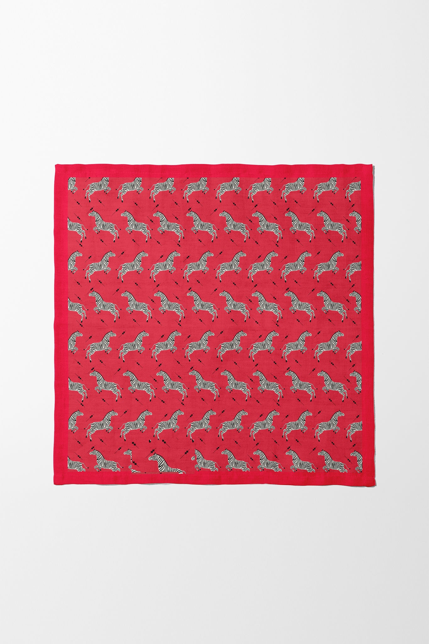 Leaping Zebras Napkin in Poppy